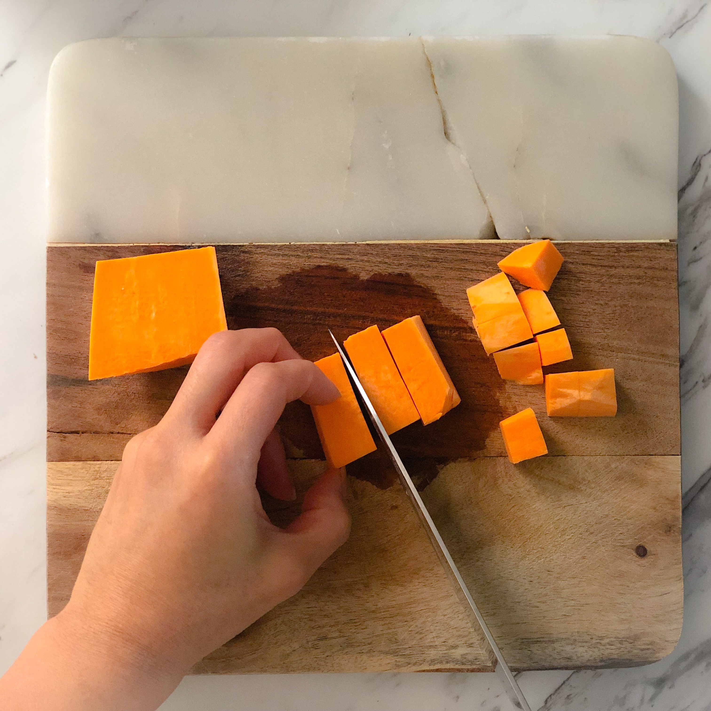 Cutting the sweet potato into small pieces