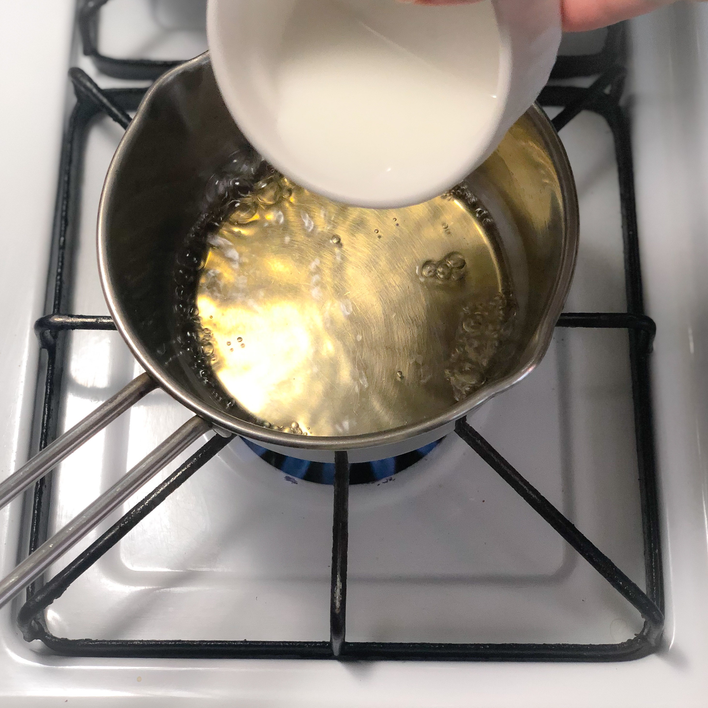 Thickening the dashi with a cornstarch slurry