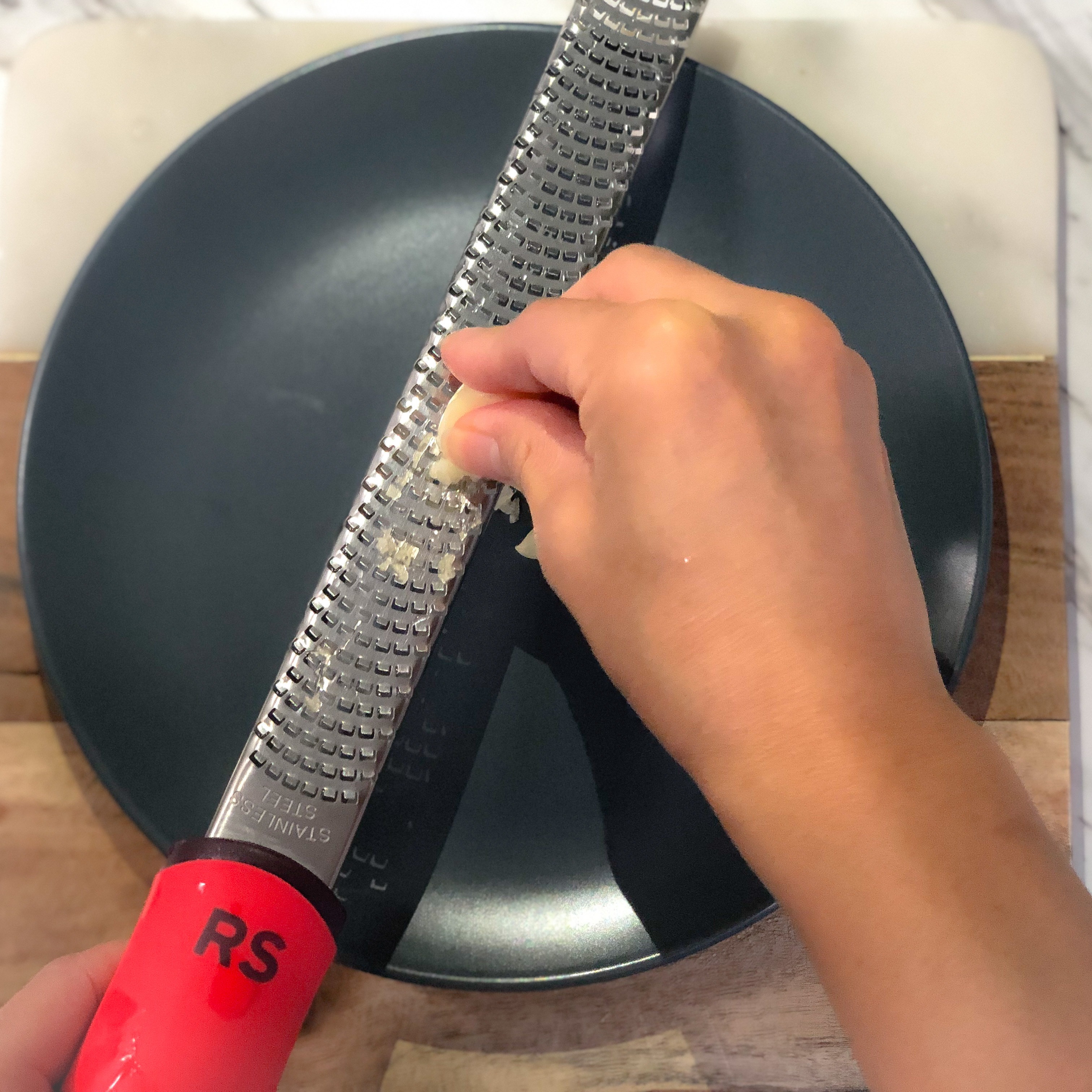 Grating ginger and garlic