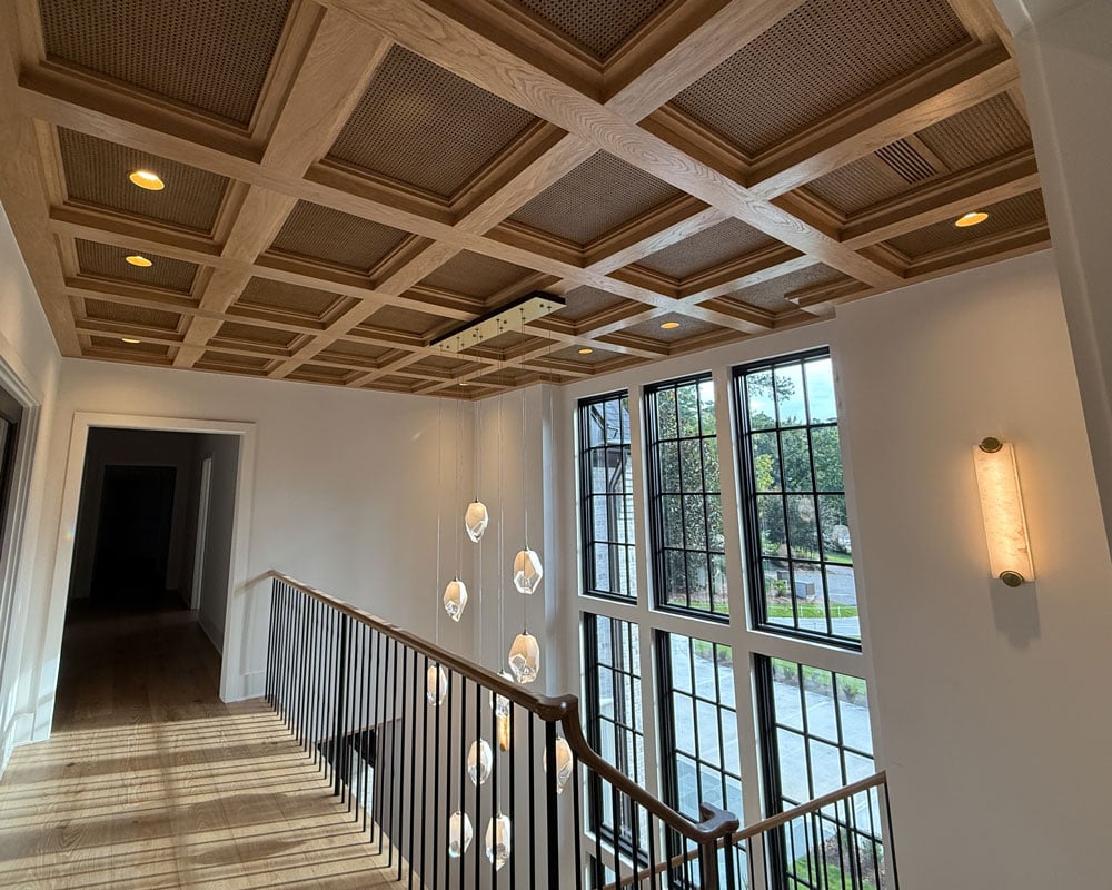 Stairway and chandelier in home