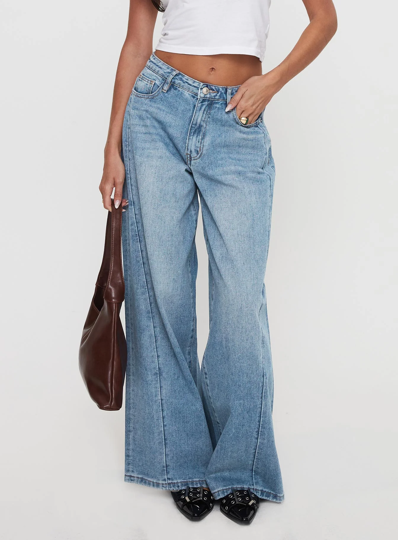 woman wearing wide leg jeans