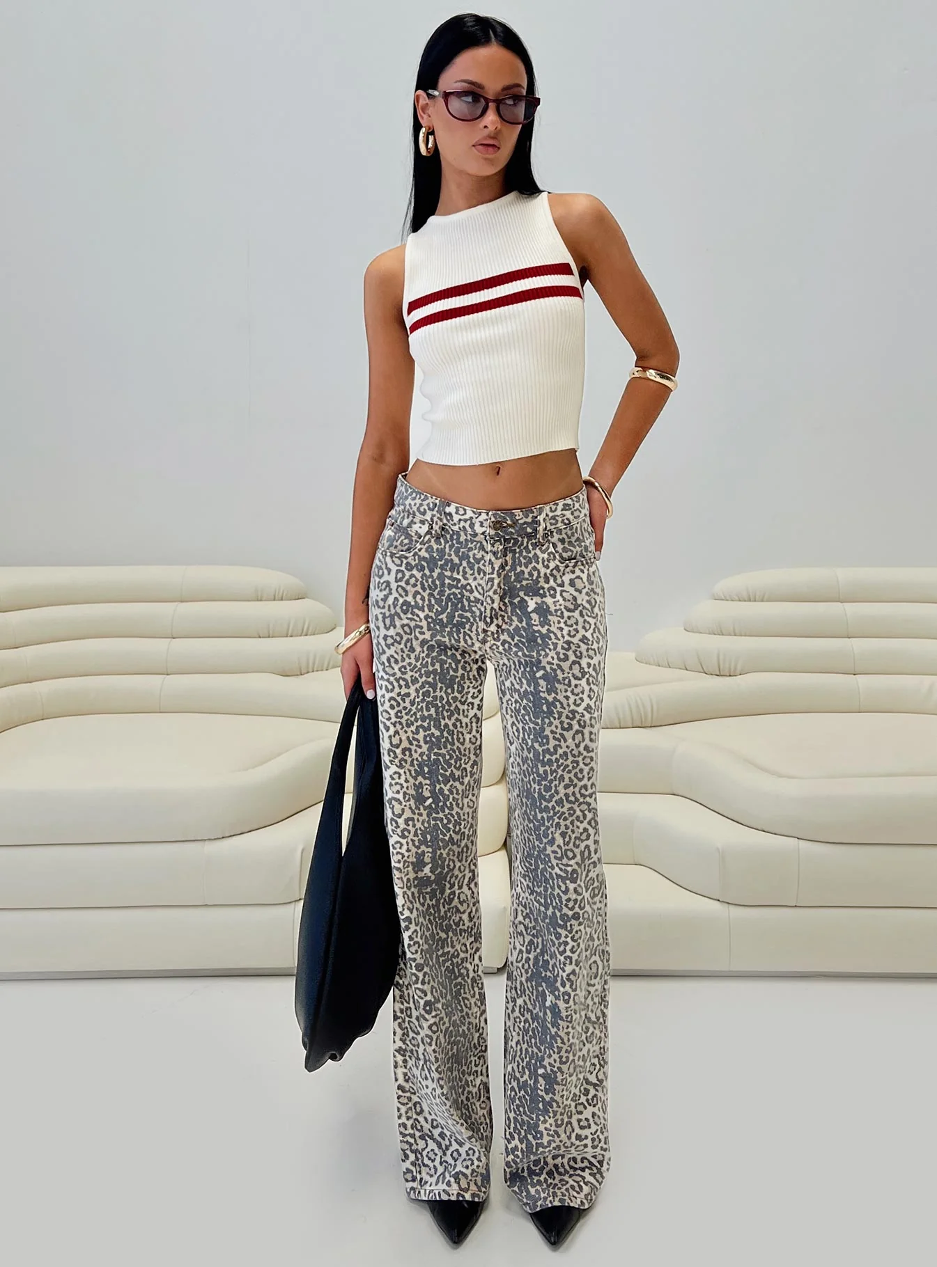 woman wearing straight leg jeans