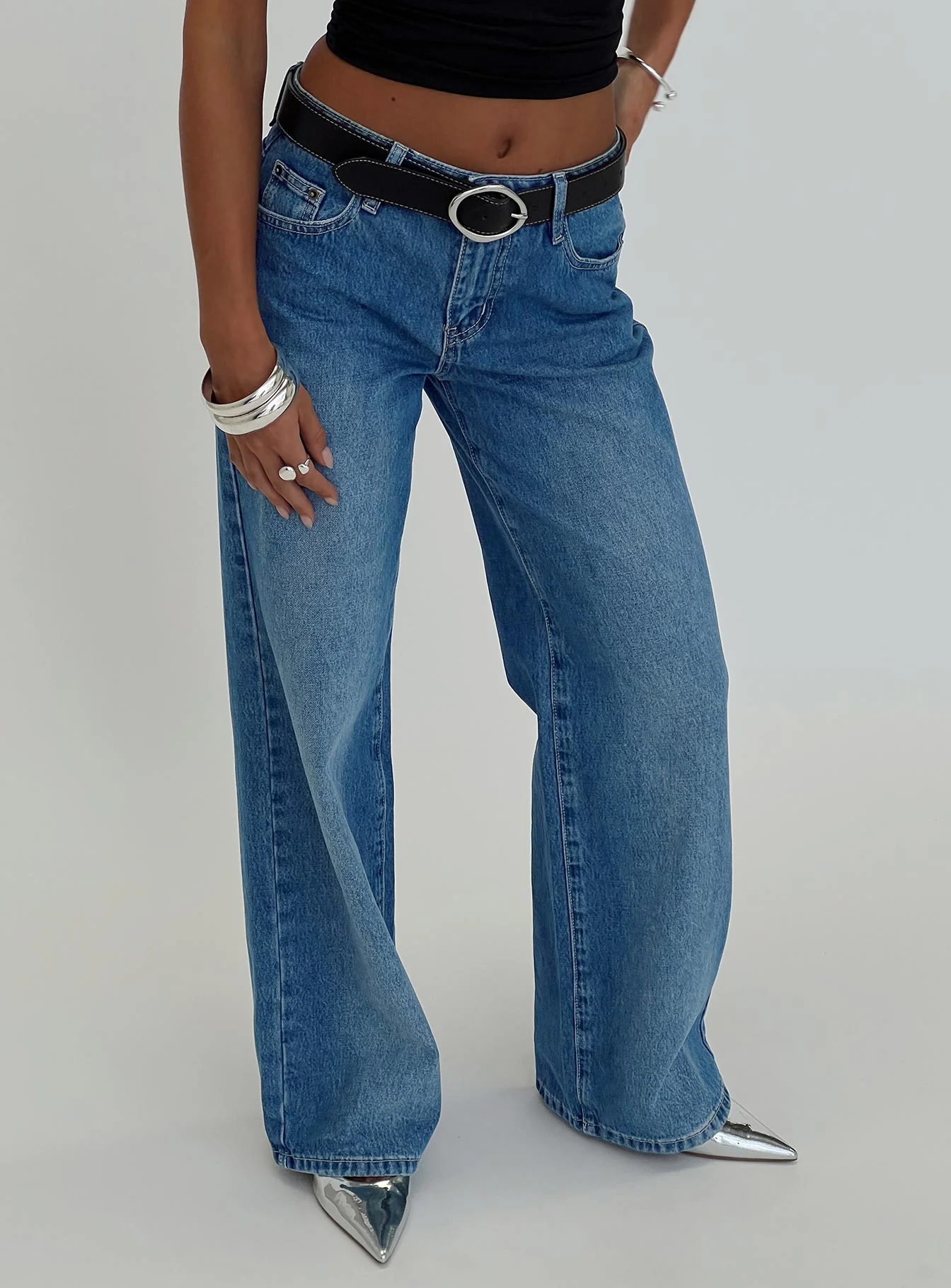 woman wearing straight leg jeans