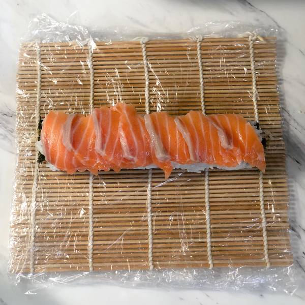 adding sliced salmon on top for a better presentation