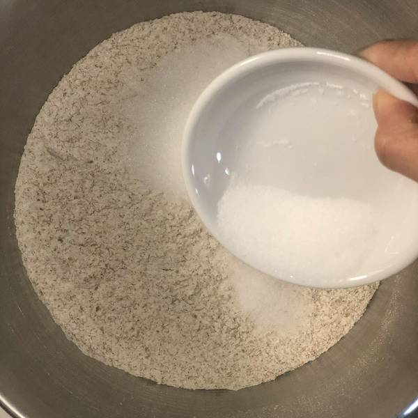 whole wheat flour, salt, and sugar added to the mixing bowl