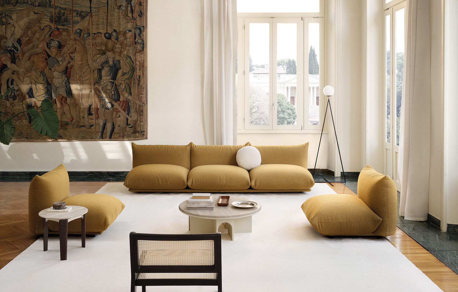 The Marenco sofa collection first designed by Mario Marenco for Arflex in 1972 has been added to, its new edition featuring the iconic pillowy form without arms. Photo c/o Arflex. 