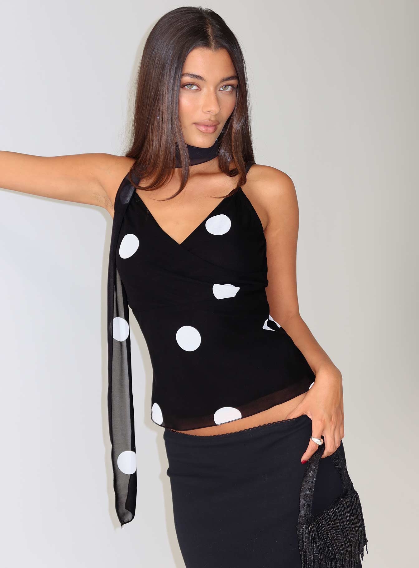 woman wearing polka dot new year's eve outfit