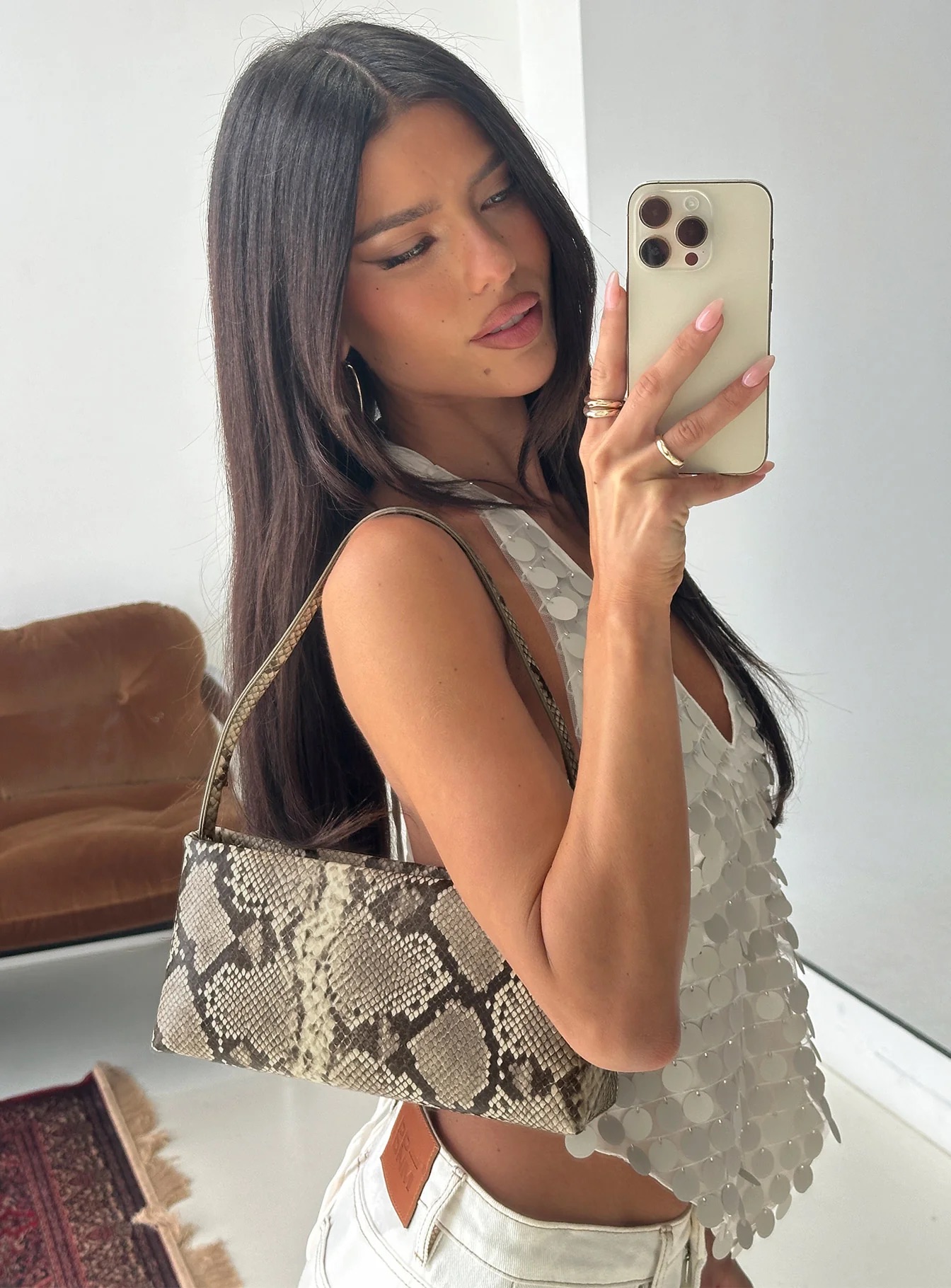 woman wearing new year's eve bag