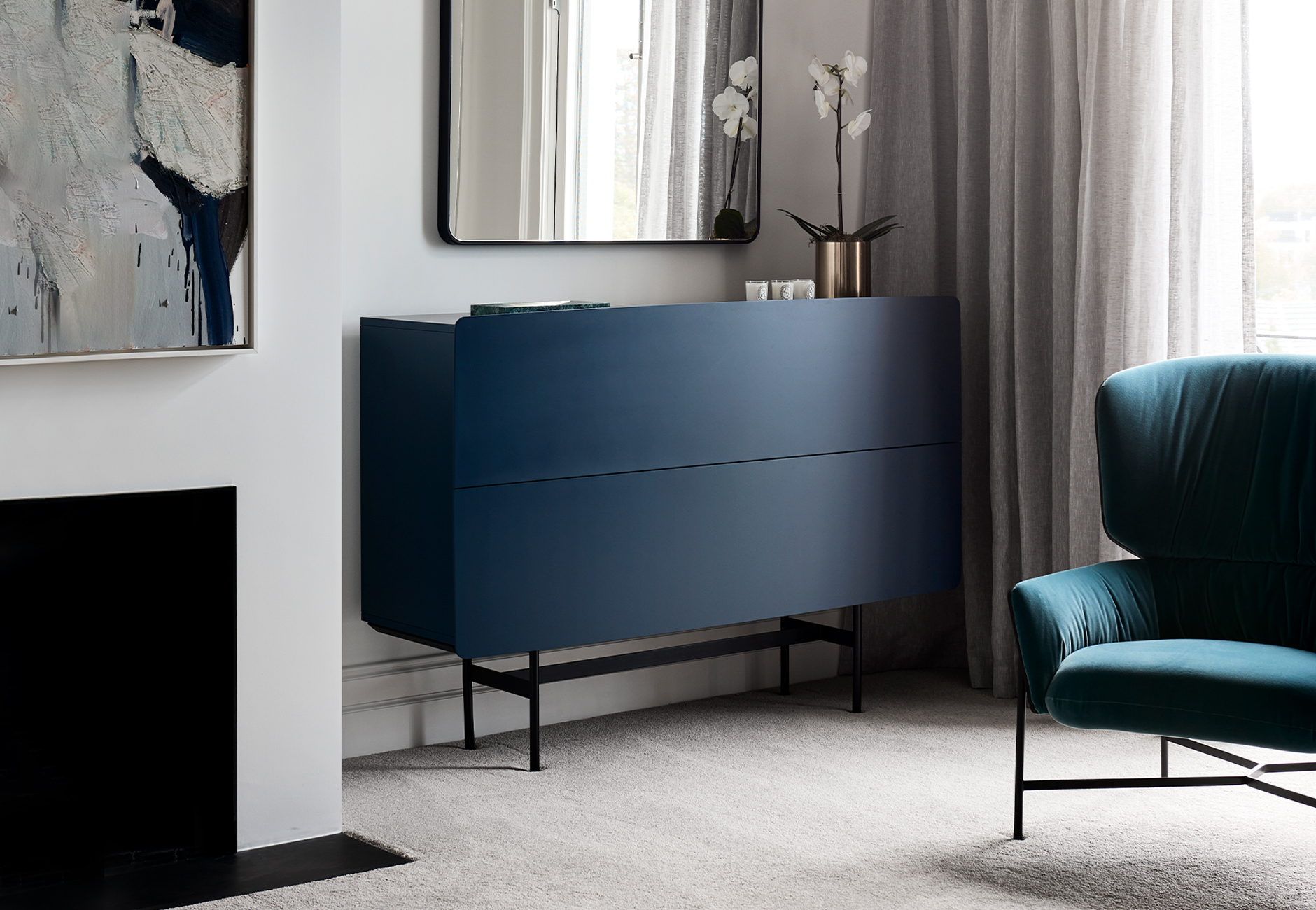 The living space features the Yee storage composition C and Caristo armchair by SP01 Design. Photo © Eve Watson.