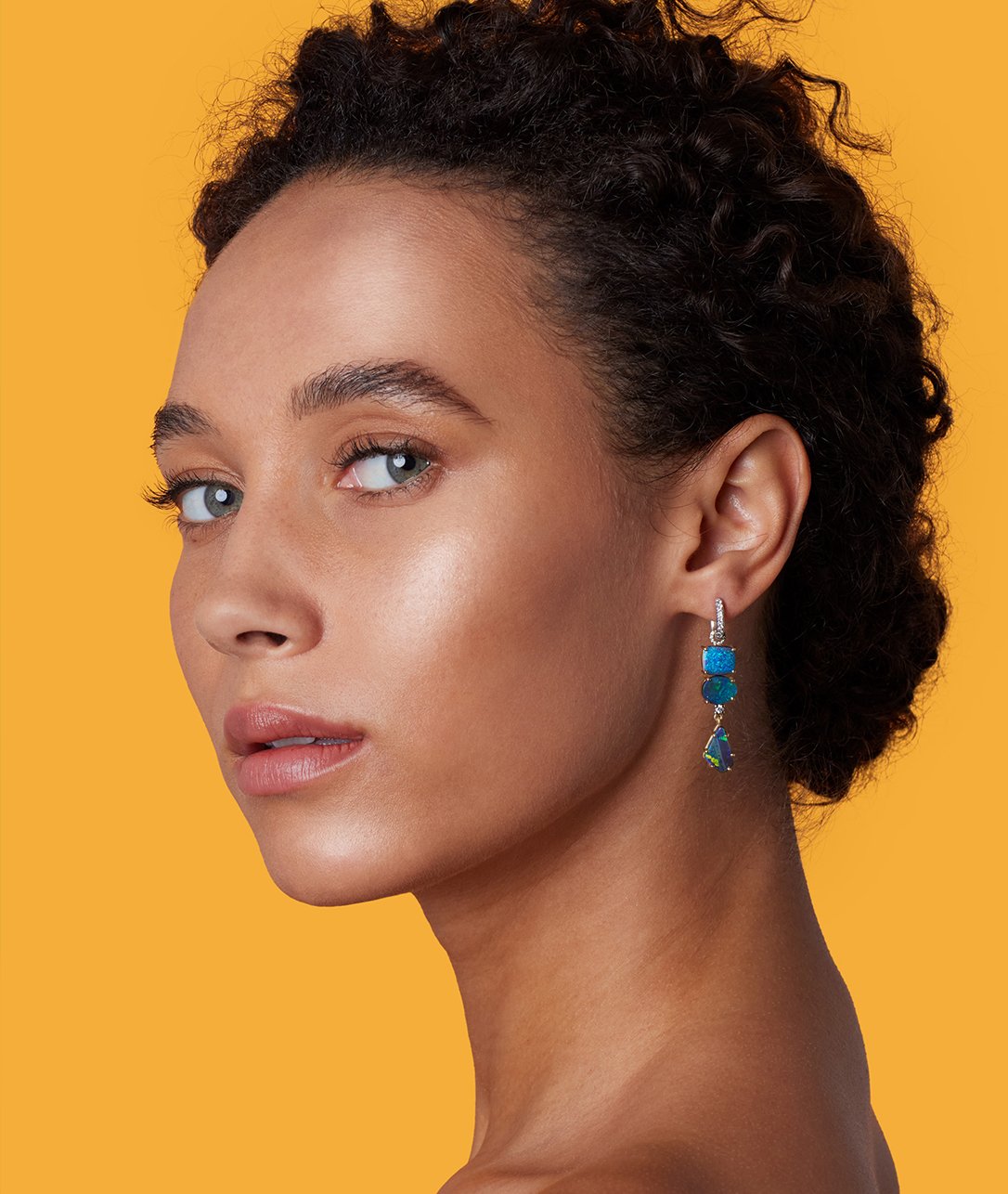 How to describe Opal Jeweled Huggies in a word? Perfection.SHOP OPAL EARRINGS