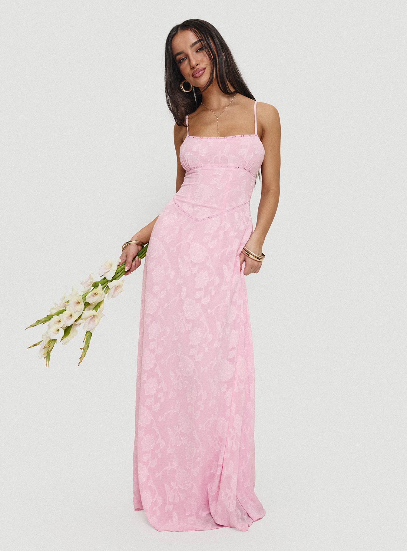 woman wearing pink maxi dress to cocktail & semi-formal spring wedding