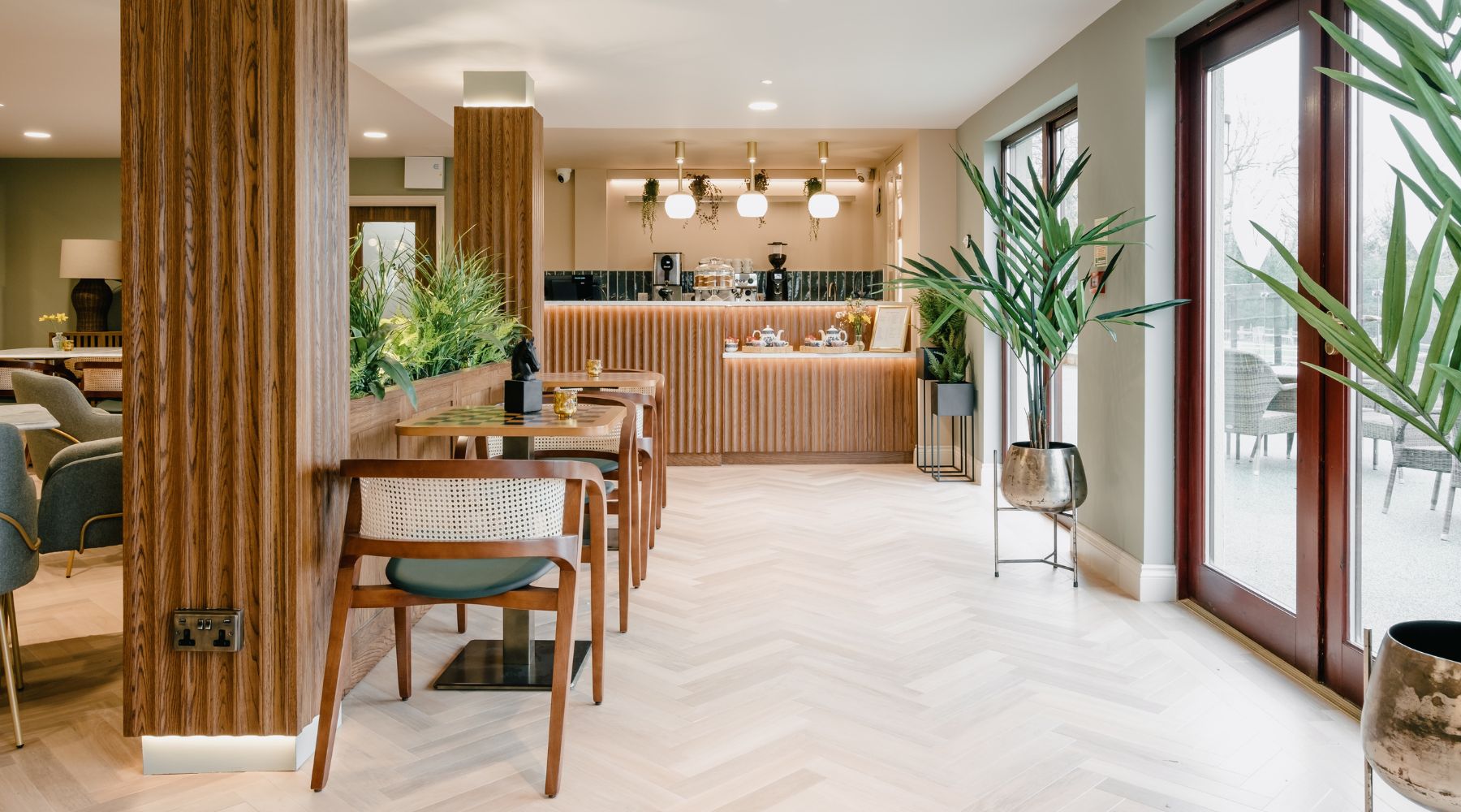 Trinity Lodge dining room with natural wood, biophilia and natural light