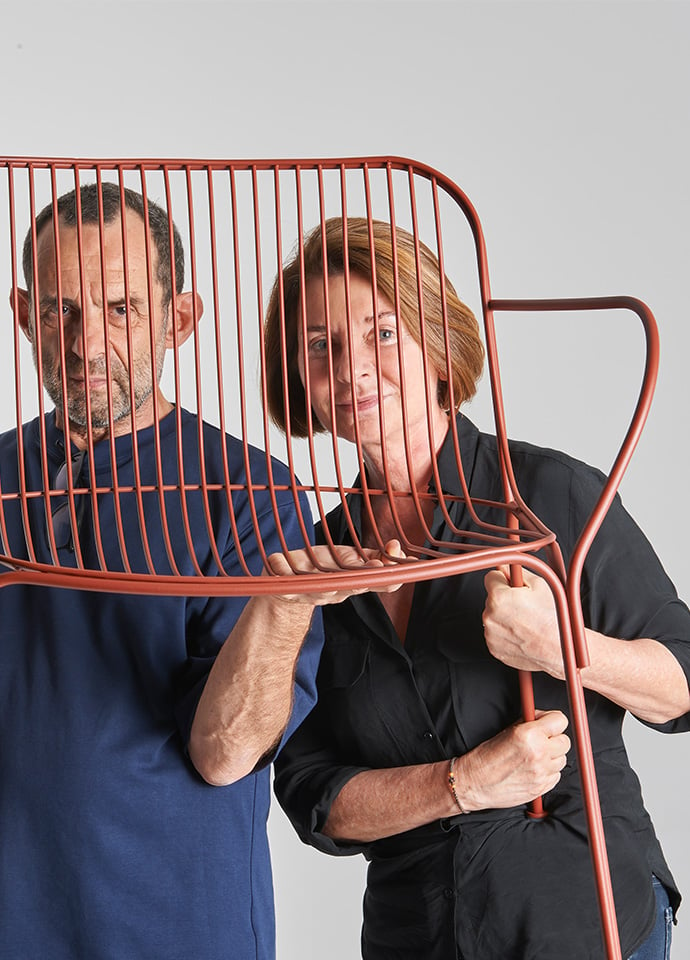 The Hiray chair in metal photographed with designers Roberto and Ludovica Palombo. Along with the addition of new bio and recycled materials to the range, metal is another important material for Kartell's circular approach to production. Photos c/o Kartell. 
