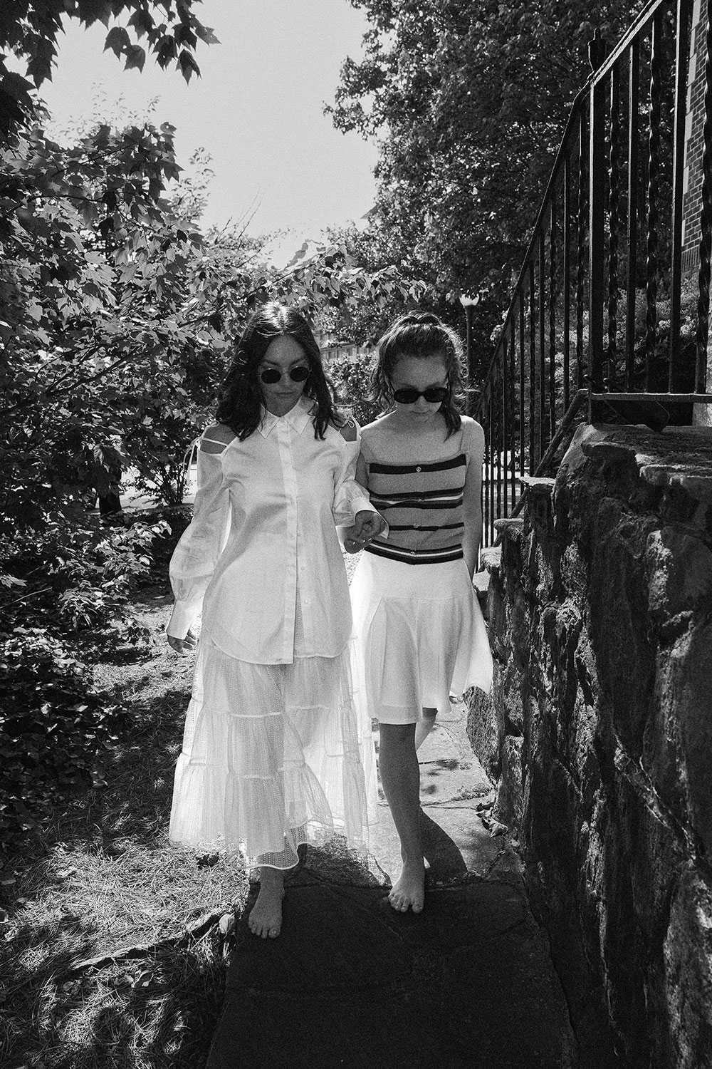 black and white photo of mother and daughter in adeam outfits