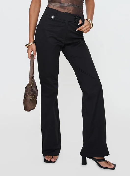 woman wearing black flare pants for work