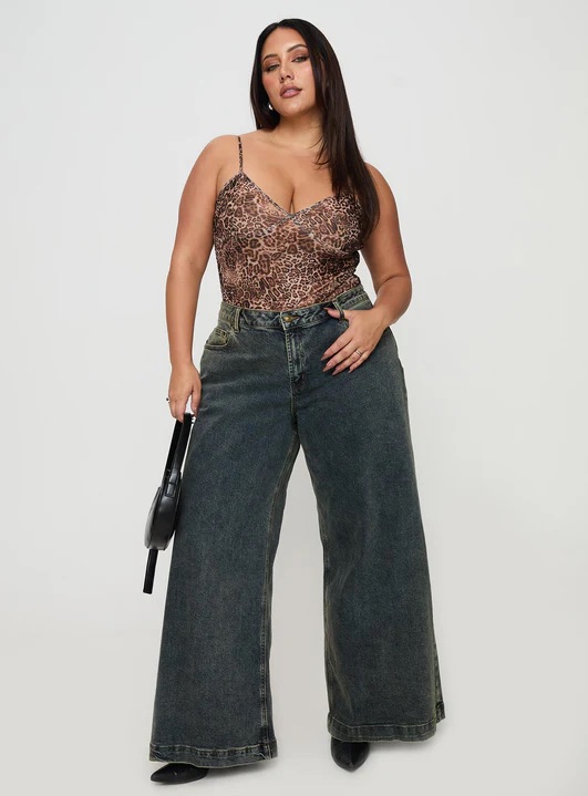 woman wearing antique wash jeans