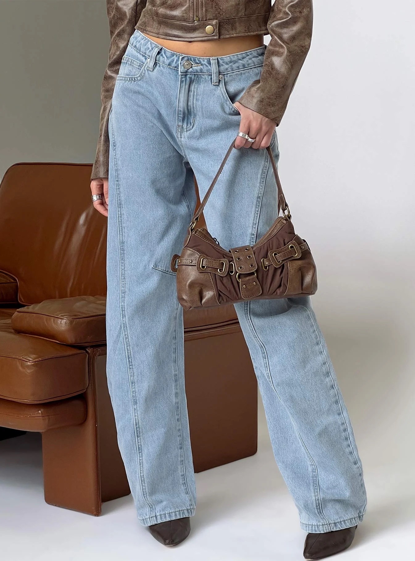 woman wearing princess polly barrel jeans