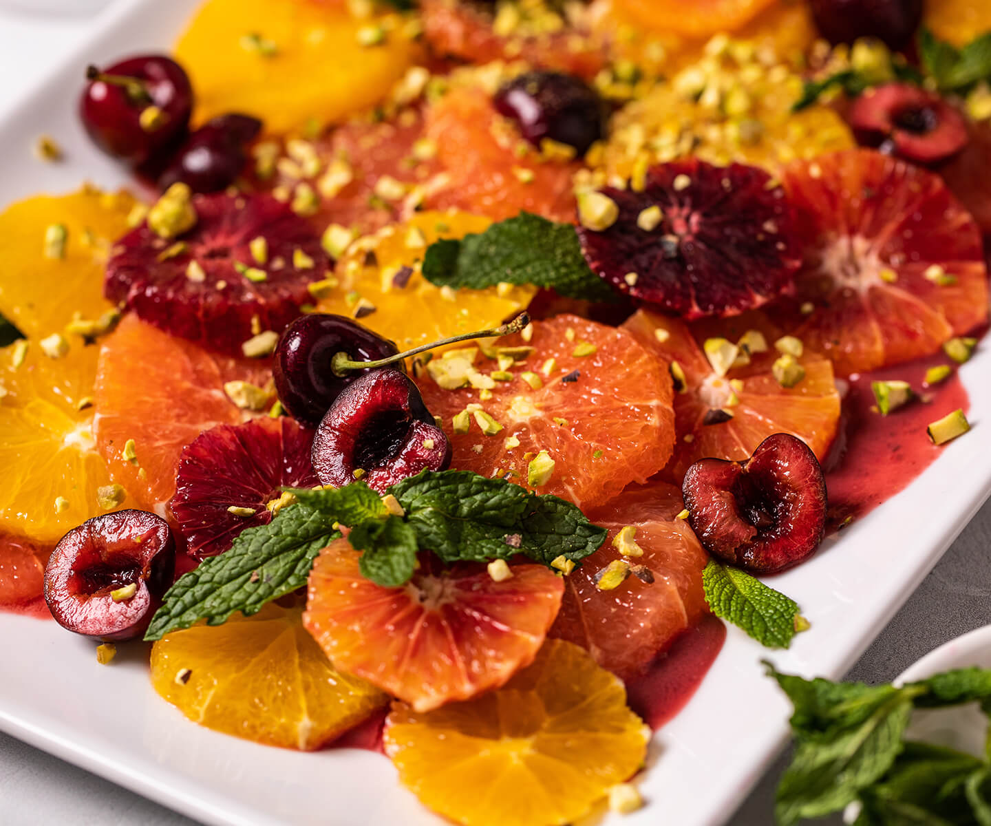 Close up shot of Citrus Salad & Cherry Blossom Vinaigrette  