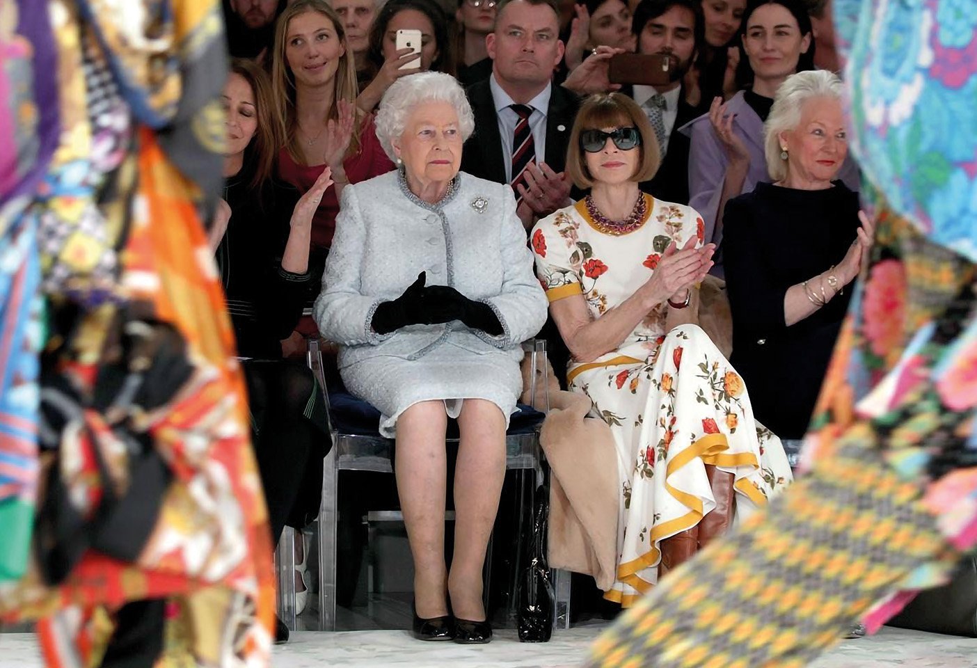 Queen Elizabeth II, Anna Wintour and Louis Ghost at the Richard Quinn show in London in 2018. Photo c/o Kartell. 