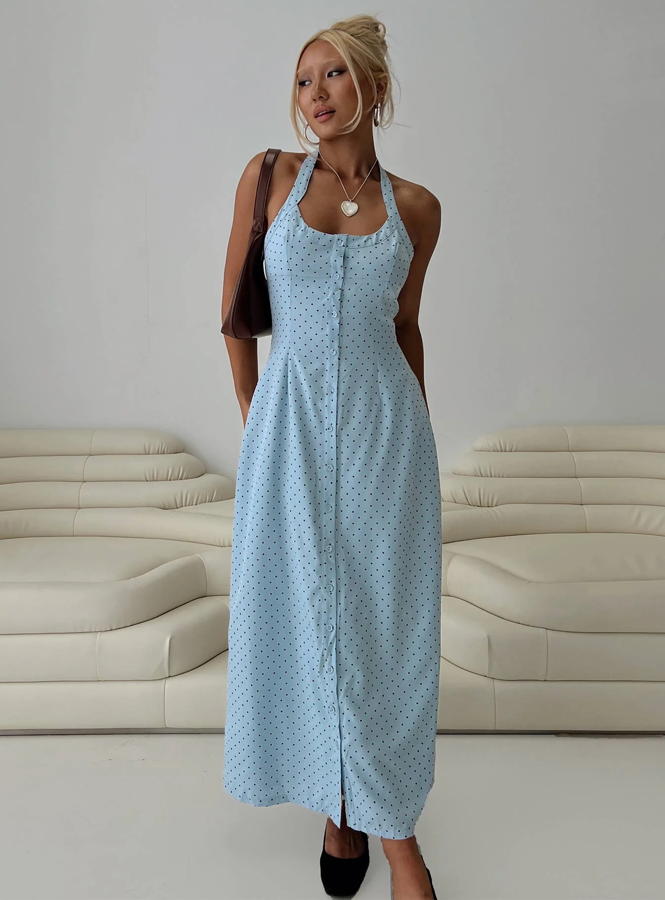 woman wearing dinner party outfit 2025