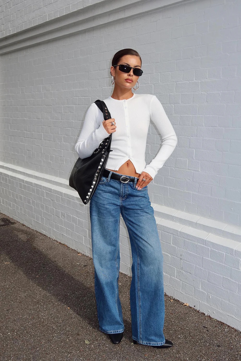 Woman wearing Princess Polly New York Fall Outfit