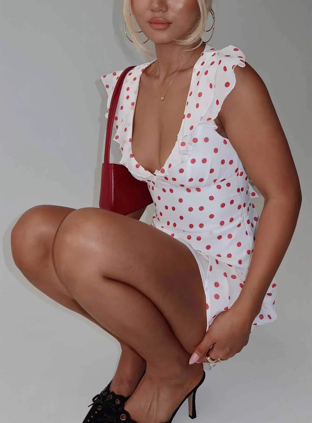 woman wearing a Princess Polly Cool Girl dress