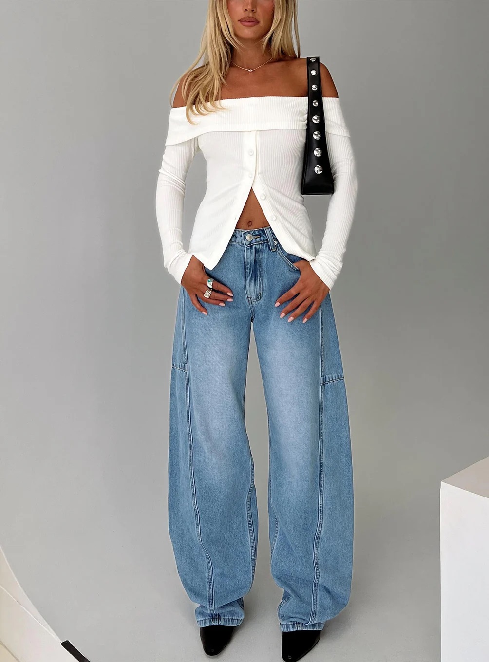 woman wearing a Princess Polly Cool Girl jeans