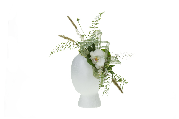 A fantastic floral fascinator combines fresh, dried, and preserved materials with one fabulous white Phalaenopsis orchid bloom.