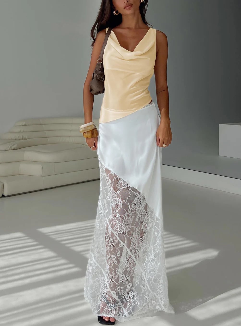 woman wearing princess polly white maxi skirt