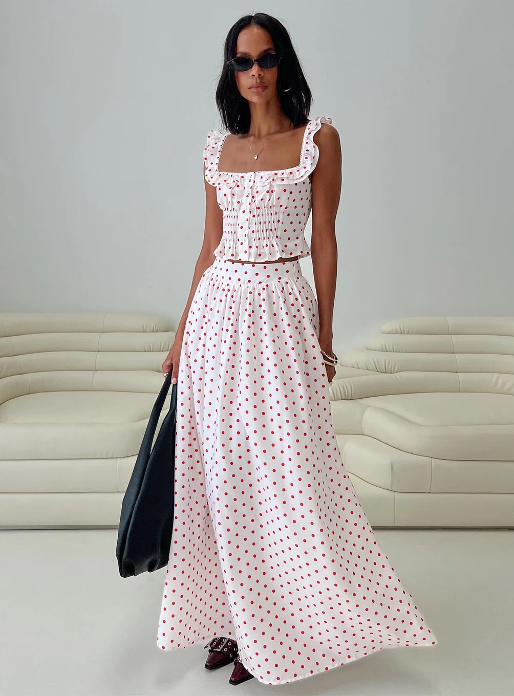 woman wearing princess polly white maxi skirt