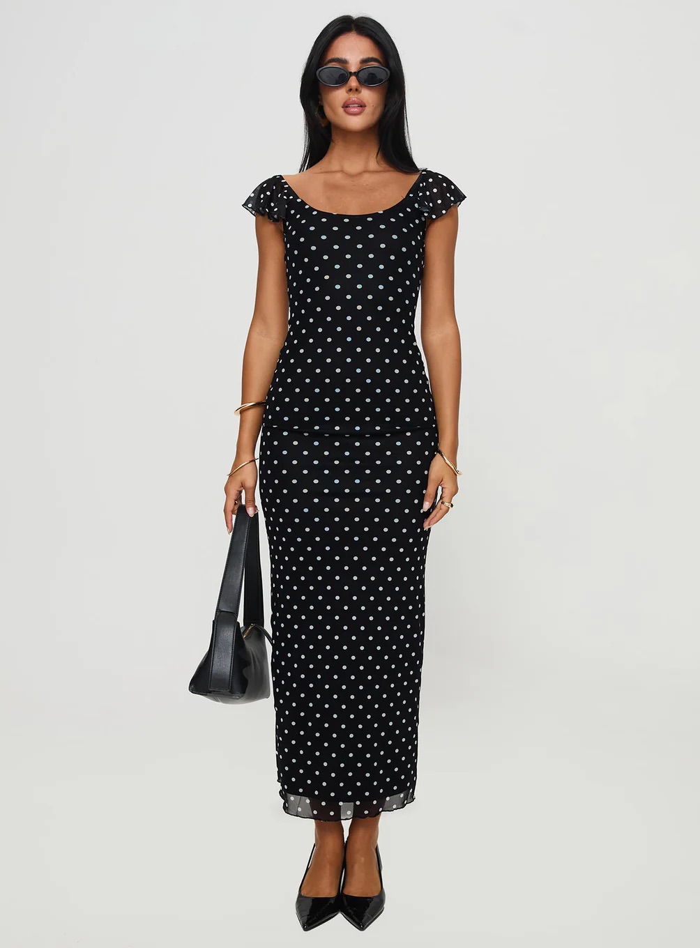 Woman wearing Princess Polly Paris Daytime Dress