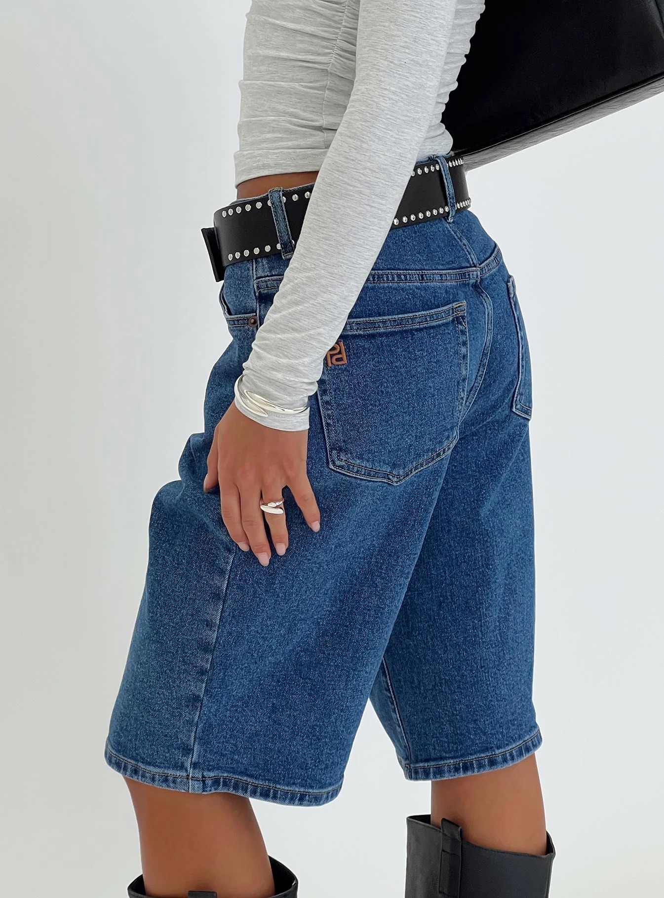 woman wearing princess polly jorts