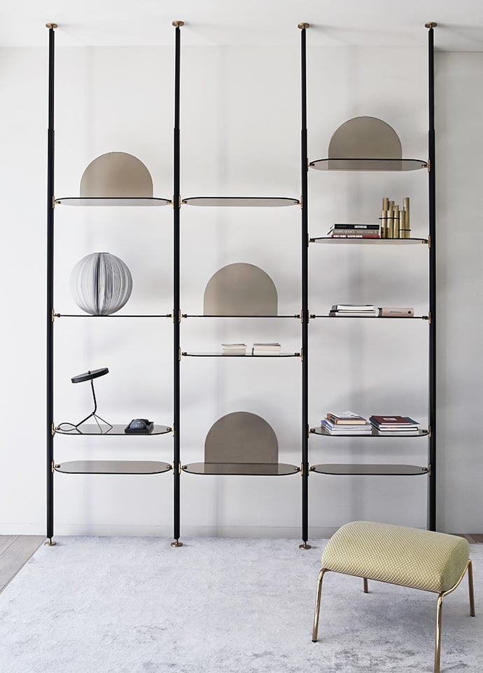 The Alba shelving system by Bernhardt & Vella for Arflex, here and following, features new finishes and details that include brass storage rings and bookends. Photos c/o Arflex.