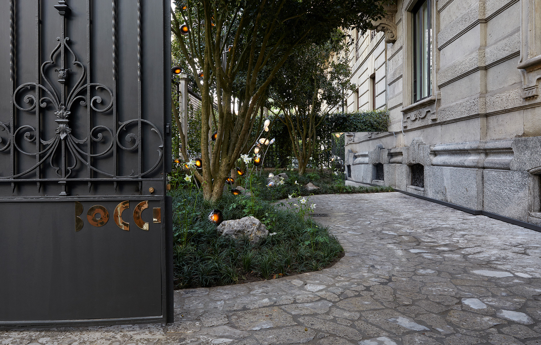 Canadian lighting brand Bocci and its new home in Milan, an intimate early 20th building Italian apartment on Zona Vincenzo Monti with a garden that also featured their outdoor collection 16g. Photo c/o Bocci.