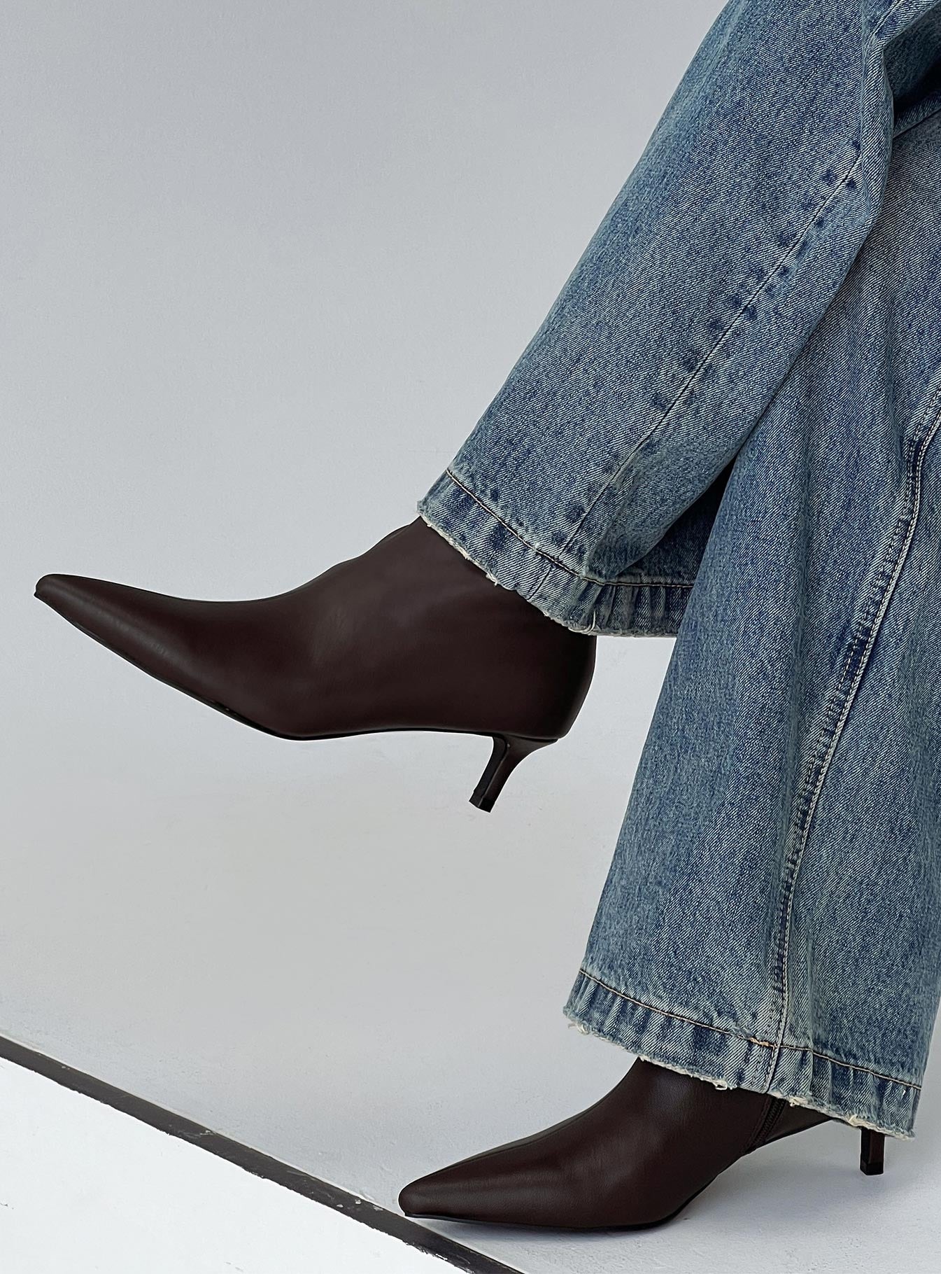 woman wearing princess polly boots for fall date night