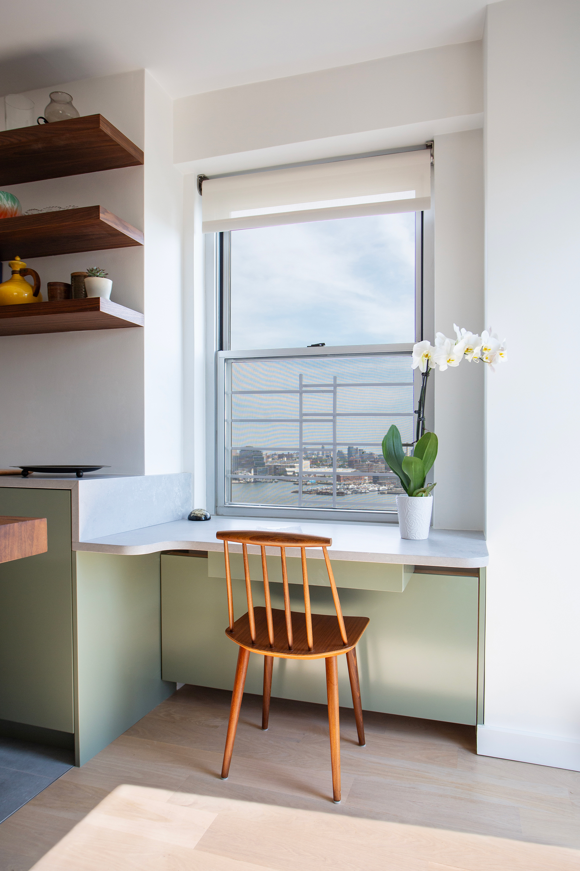 Premium hardwood floors paired with modern architectural elements in Grand Street home