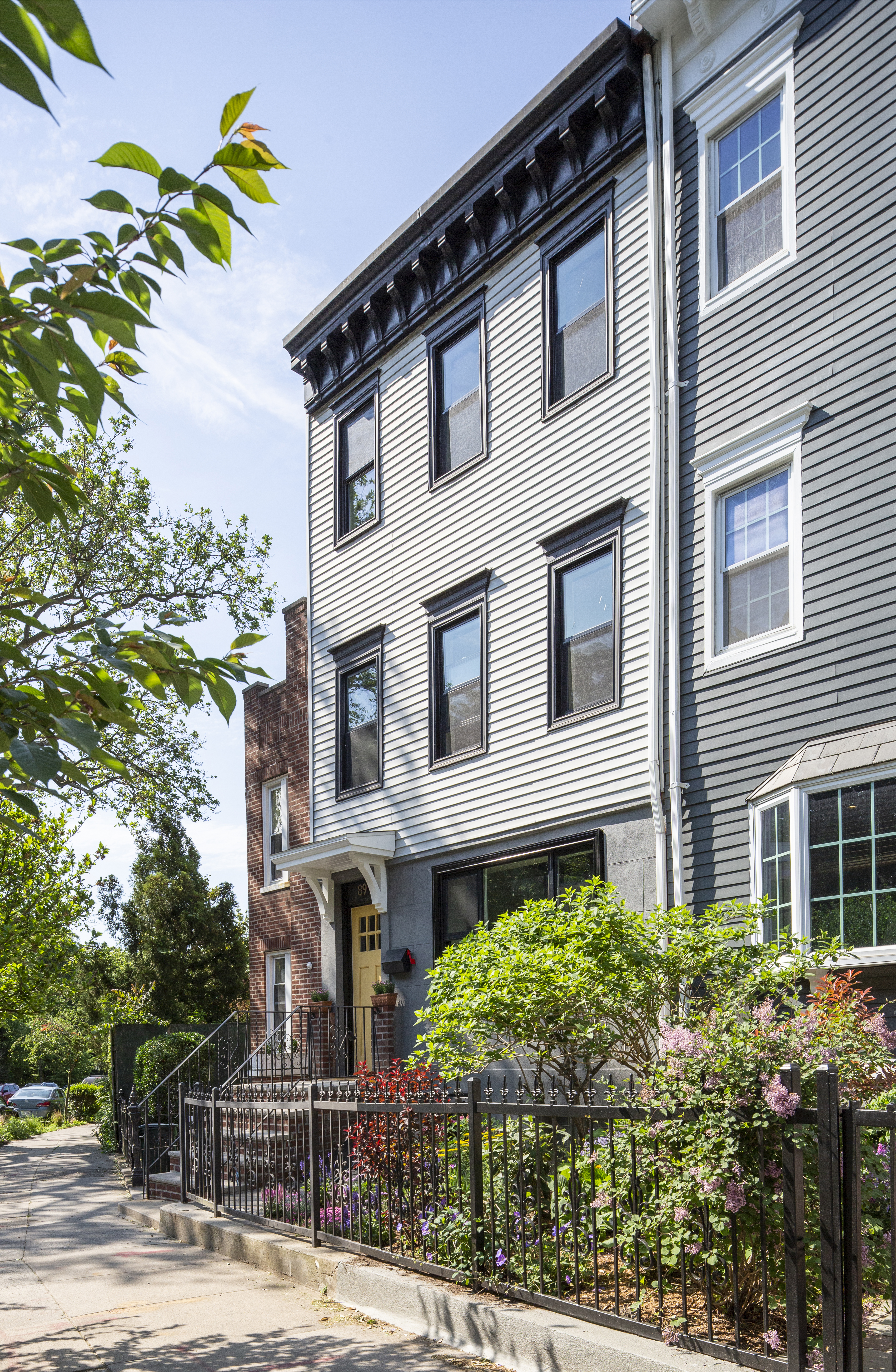 Premium hardwood floors creating warmth and texture in Brooklyn luxury home interior
