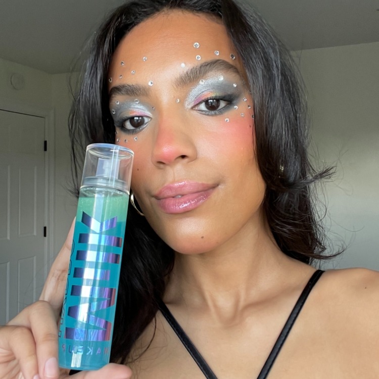 Lexus Perez wears Milk Makeup Hydro Grip Eye Primer and colorful makeup with rhinestones.