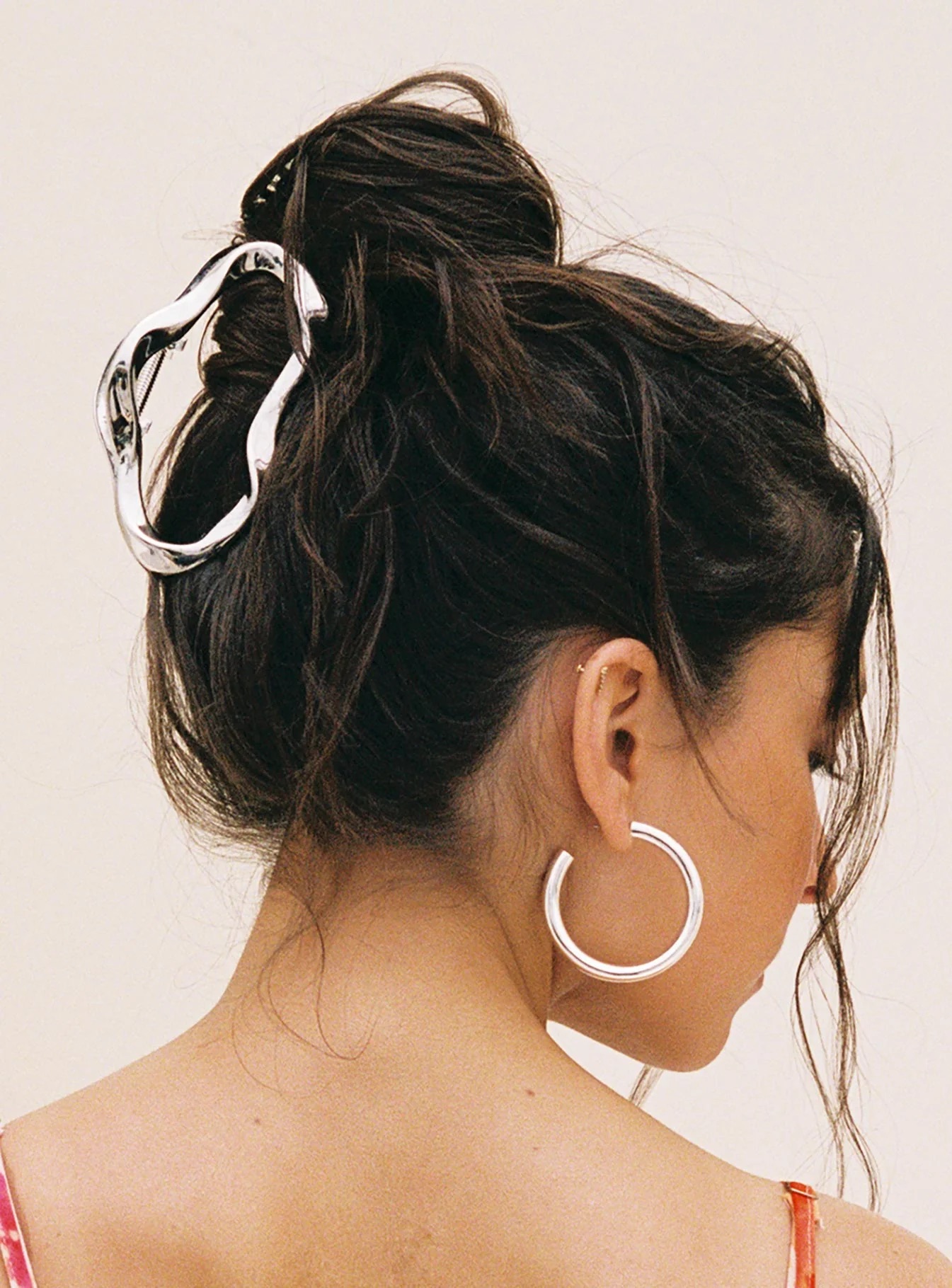 woman wearing princess polly work from home hair clip