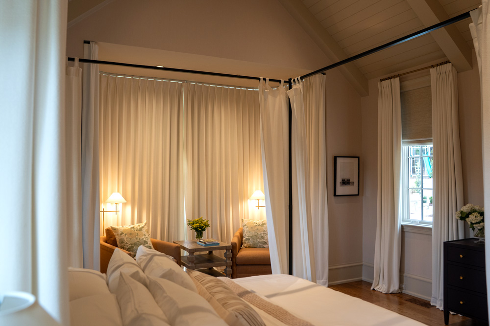 Window with closed drapes in bedroom