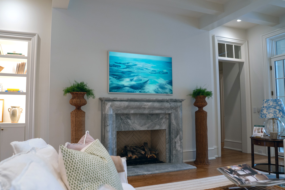 TV mounted on the wall of a living room