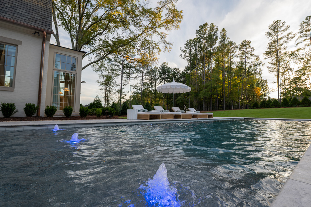 Swimming pool in backyard of a home