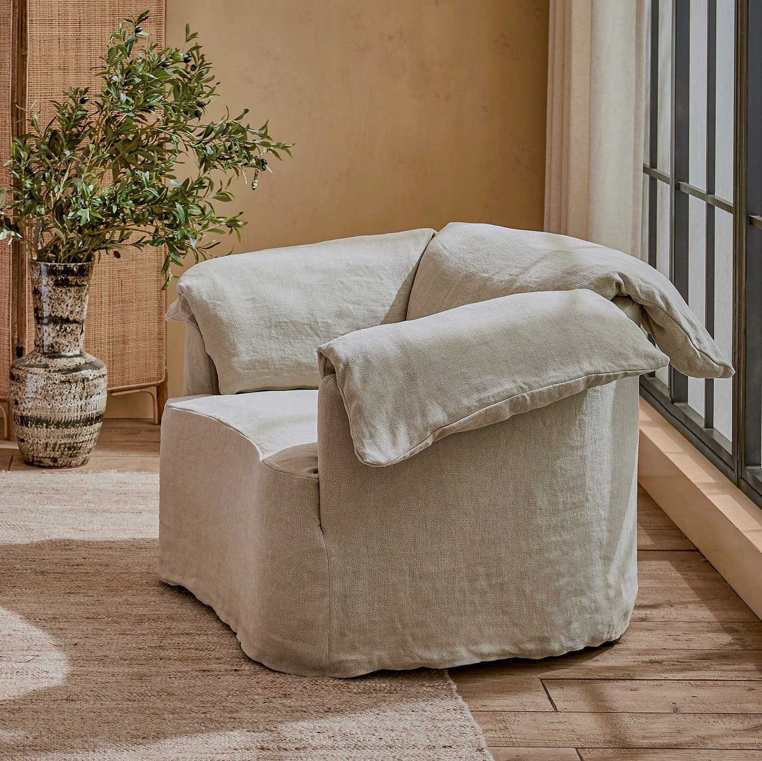 Loula Chair in Jasmine Rice, a light warm greige Medium Weight Linen