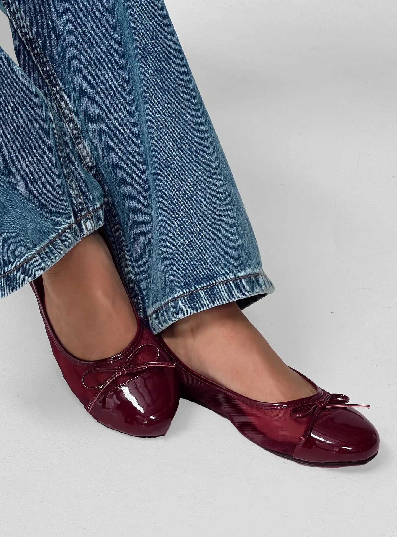 woman wearing ballet flats for winter date night