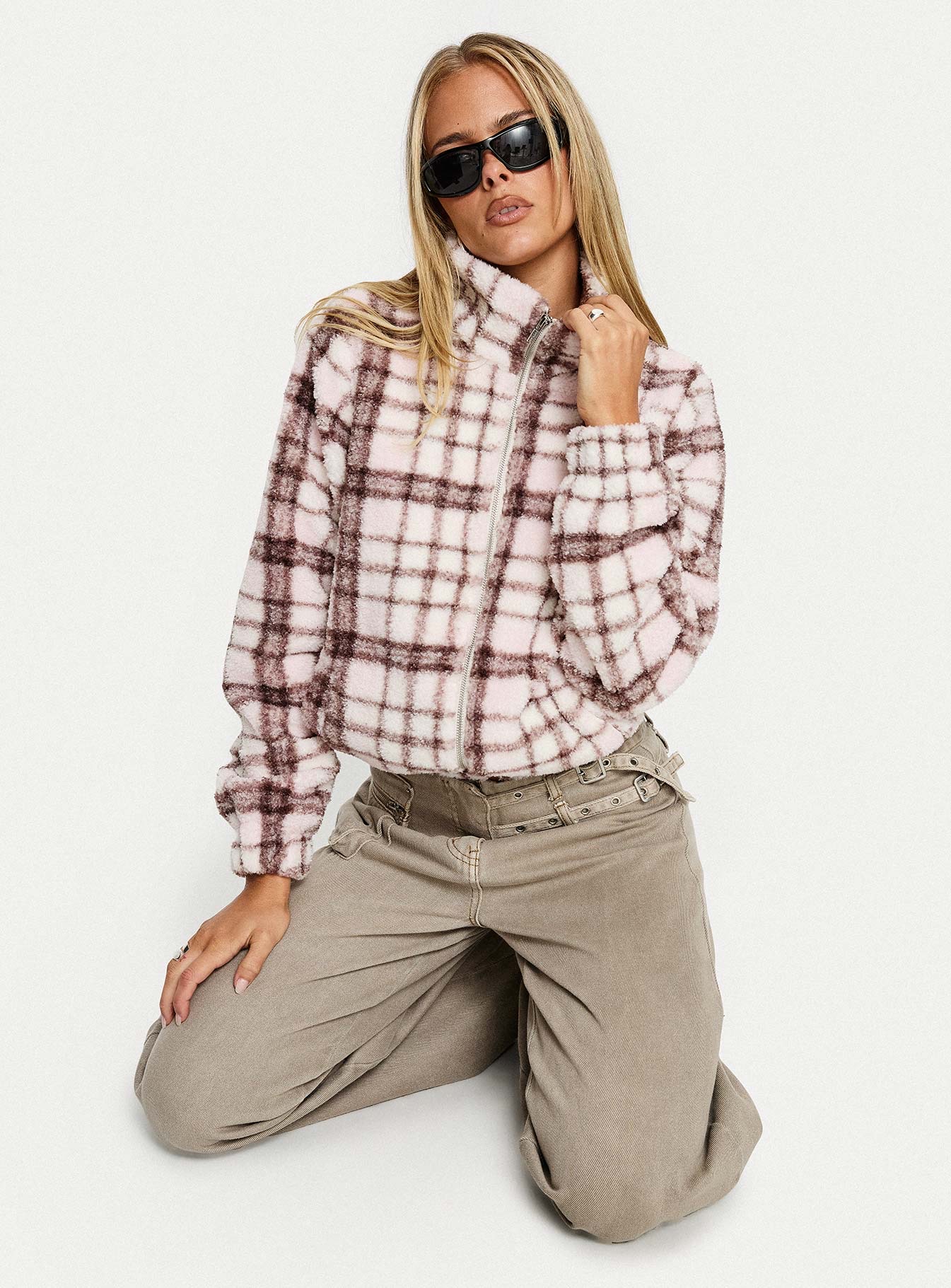 woman wearing princess polly funnel neck jacket - winter 2025 fashion trends