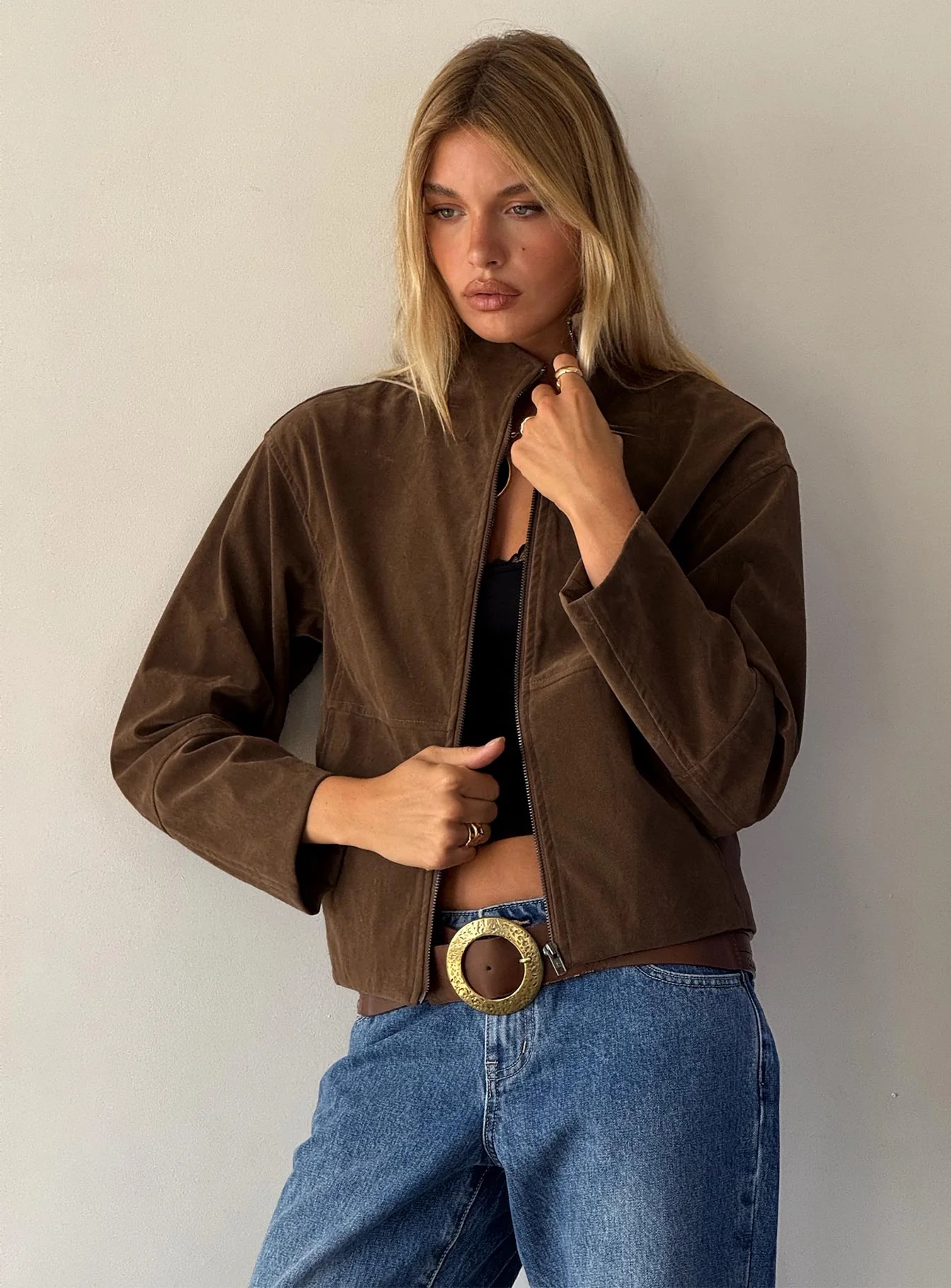 woman wearing princess polly funnel neck jacket - winter 2025 fashion trends