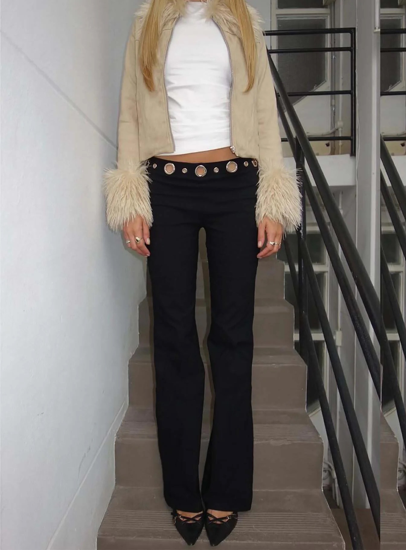 woman wearing princess polly eyelet pants - winter 2025 fashion trends