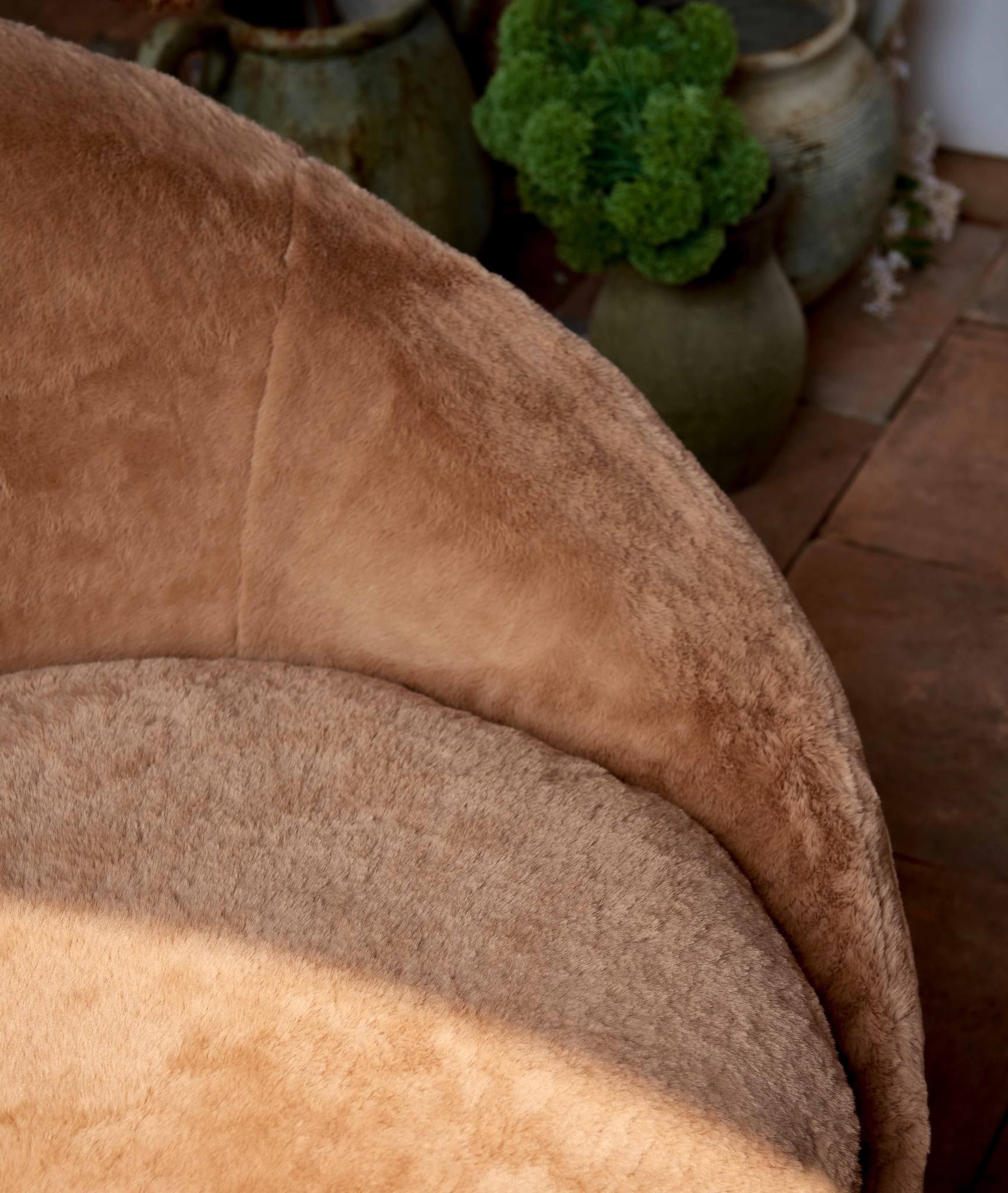 Close up of Ozzi Chair in Recycled Faux Fur Kiwi Fuzz