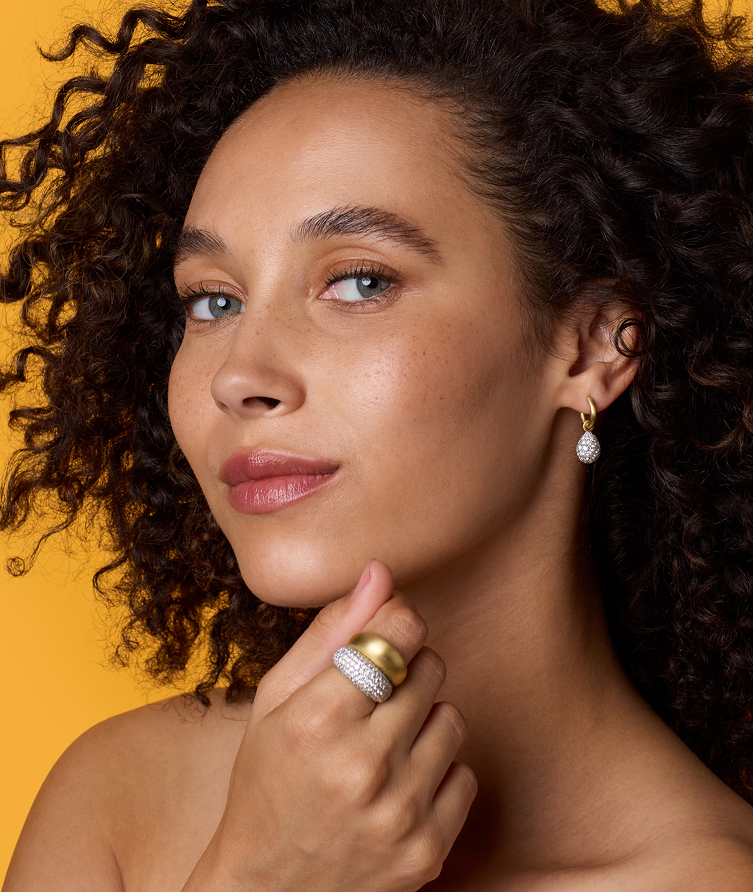 Our Puffed Gold and Diamond Pavé Dome Rings catch the light just right in the warm sun.SHOP PUFFED GOLD DOME RINGS