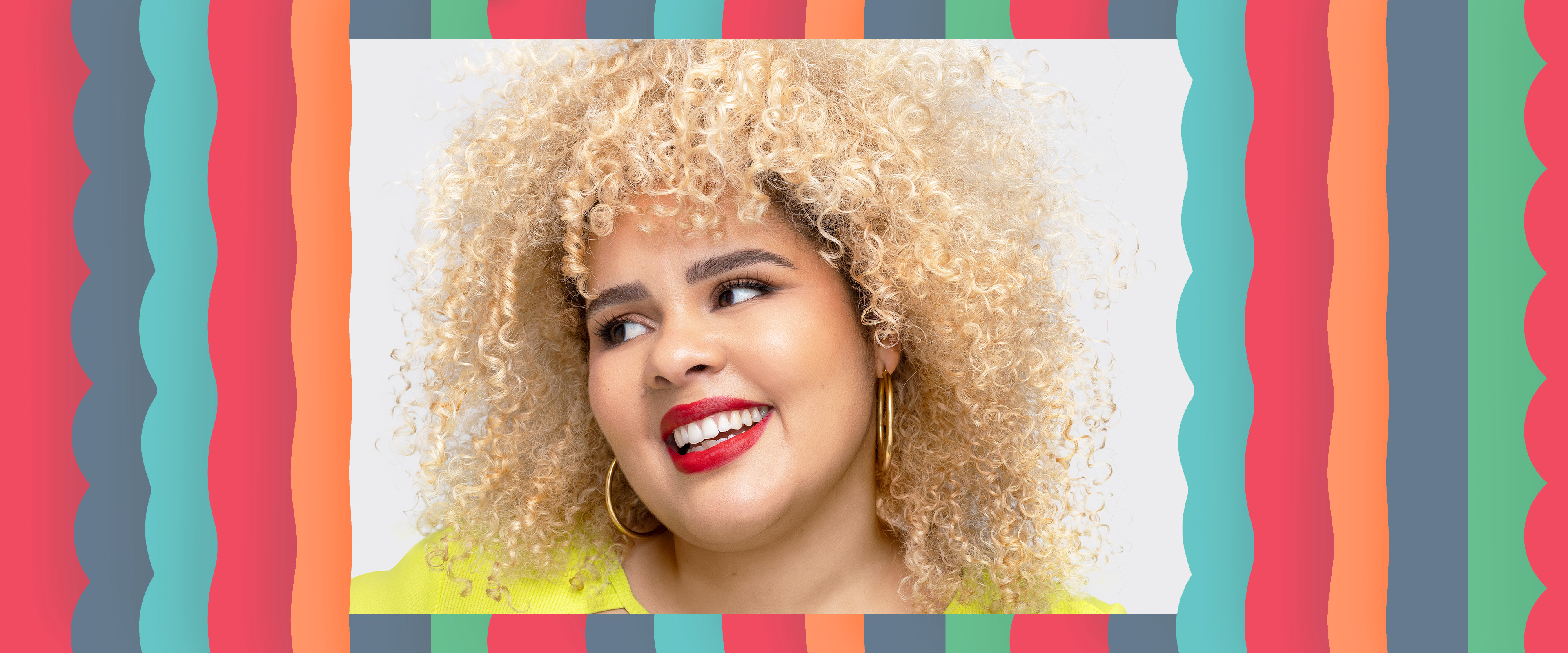 headshot of curl expert + RosiCurls Salon Owner Rosi Mercedes